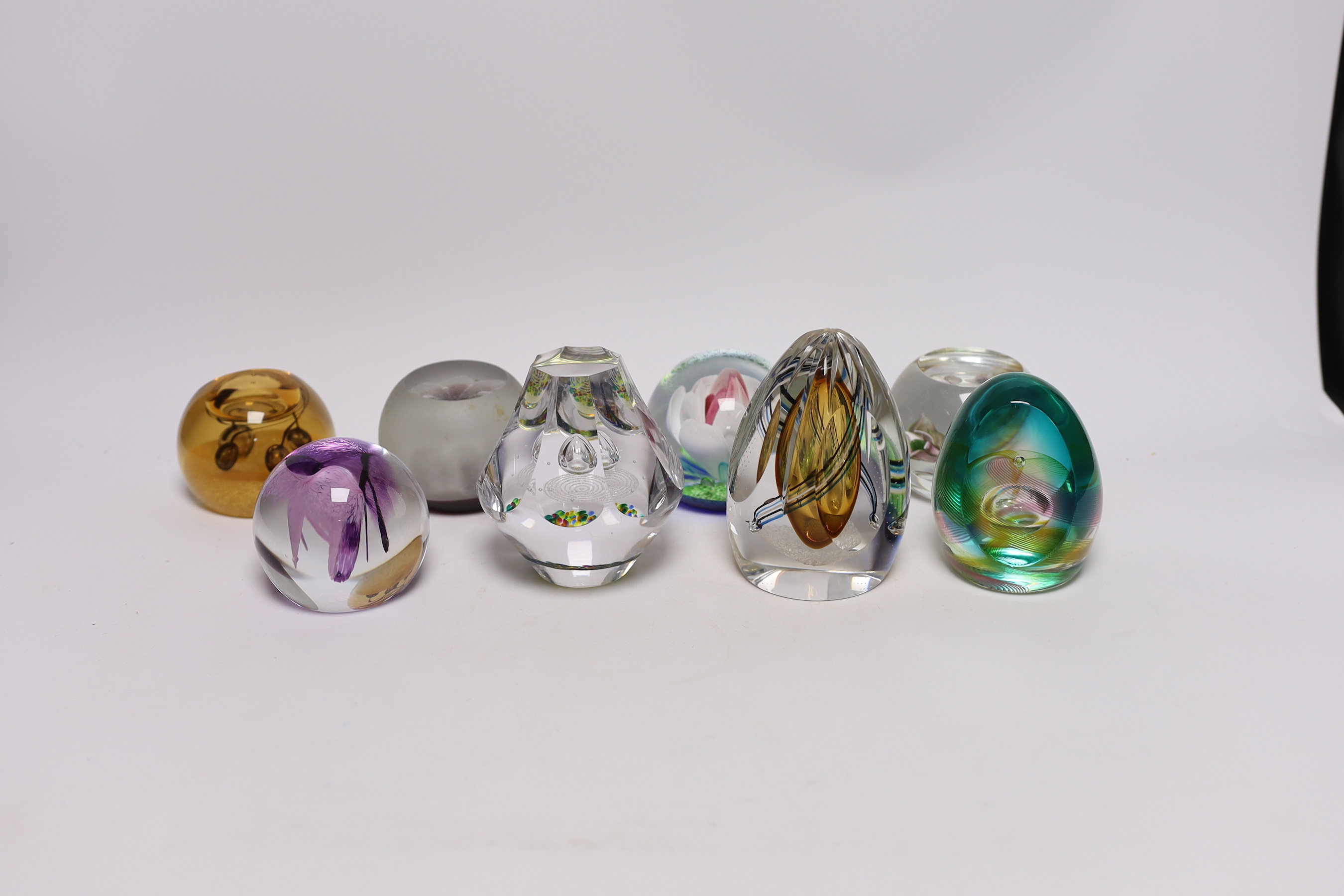 Eight limited edition Caithness glass paperweights, four with boxes